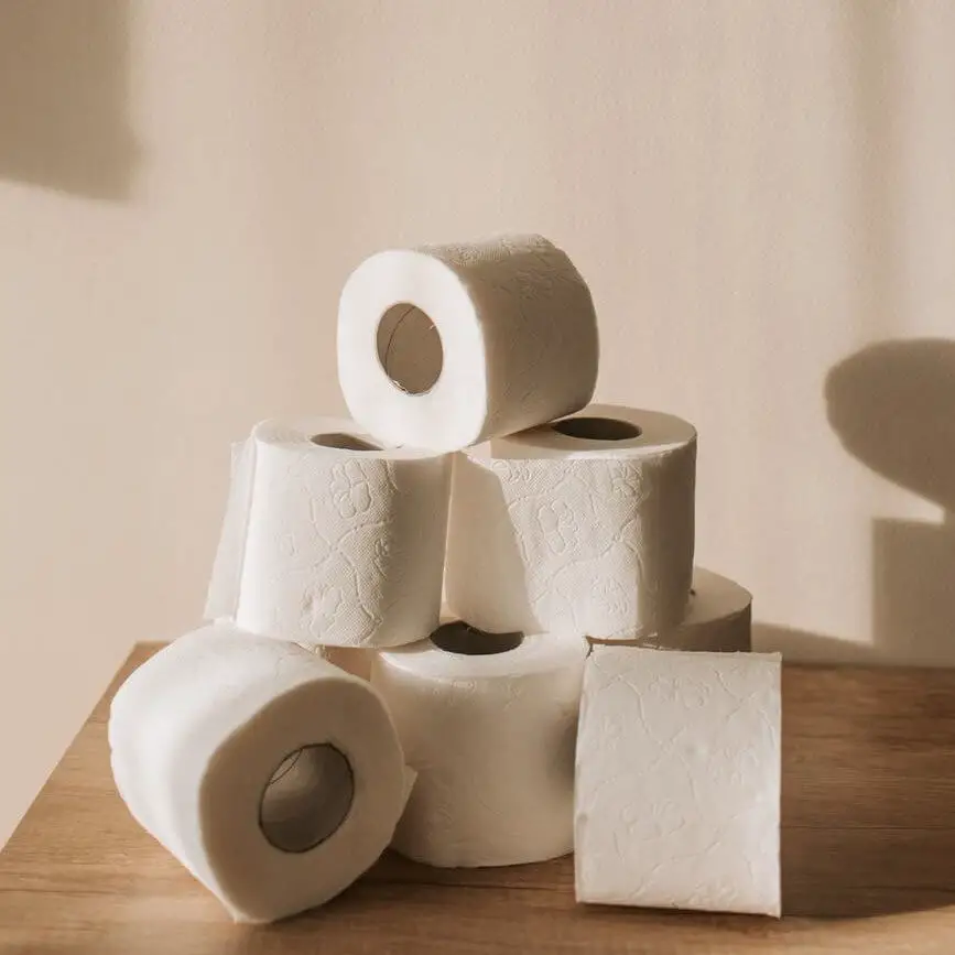 white tissue paper roll on white textile