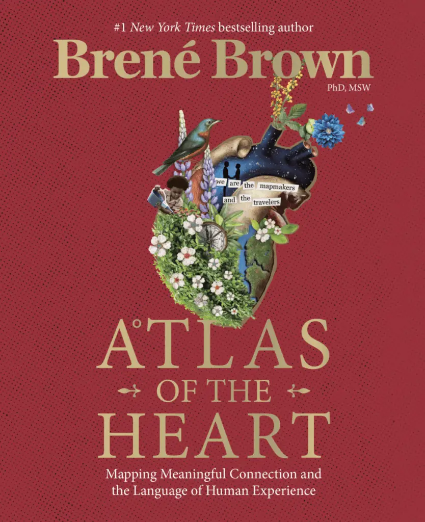5 Books to Nourish Your Soul; Atlas of the Heart by Brene Brown Mapping Meaningful Connection and the Language of Human Experience; Red background with gold letters for the title and the subtitle in smaller white letters; in the center is a physical heart dressed up in earthy things like a bird, flowers, a child holding a watering can, and the words "we are the mapmakers and the travelers"